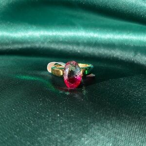 Gold Stainless Steel Ring With A Large Oval Pink Gem